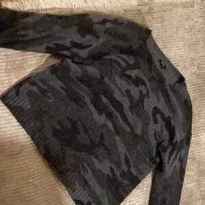I’m selling a camo Kashmir crewneck sweater